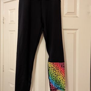 ZYIA light n tight black leggings with rainbow leopard detail.
